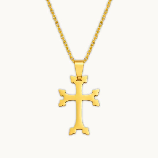 Pendentif croix arménienne en or sur fond clair