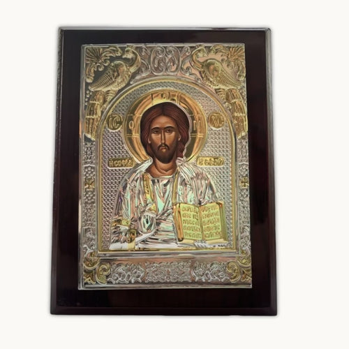 Icône orthodoxe du Christ en bois et argent sur fond clair