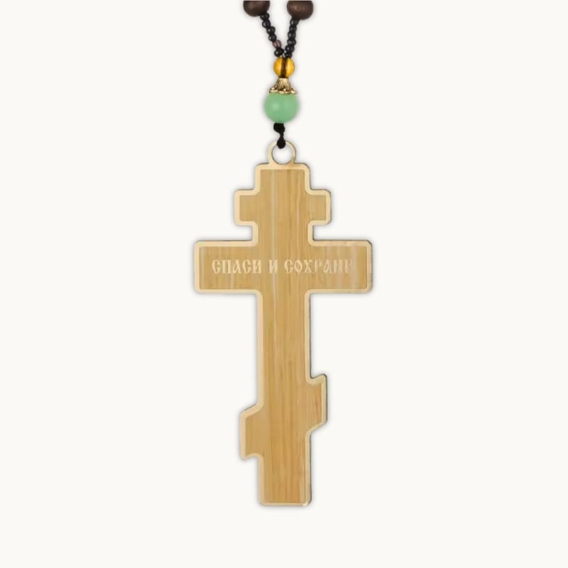 Dos du pendentif croix orthodoxe en bois marron clair