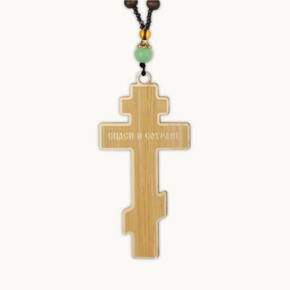 Dos du pendentif croix orthodoxe en bois marron clair