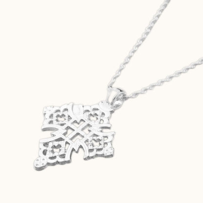 Pendentif croix éthiopienne orthodoxe argentée – design traditionnel ajouré
